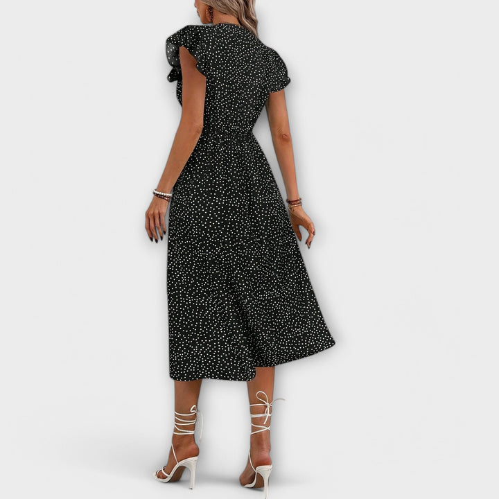 Oda - Chic red polka dot knee-length dress with button closure