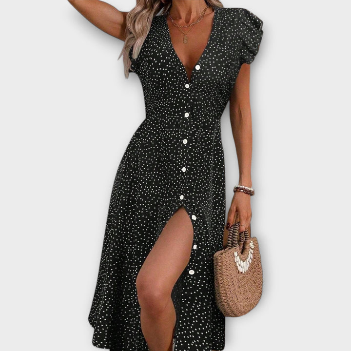 Oda - Chic red polka dot knee-length dress with button closure