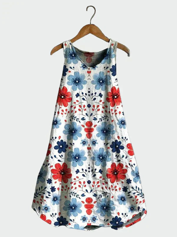 Liv - Hvit kjole med røde og blå blomster