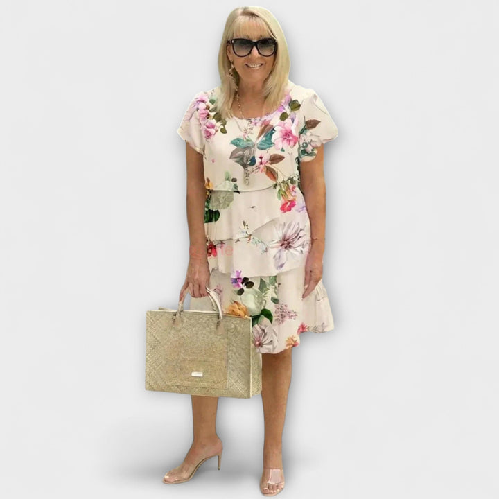 Iselin - Hvit elegansekjole med blomstermønster