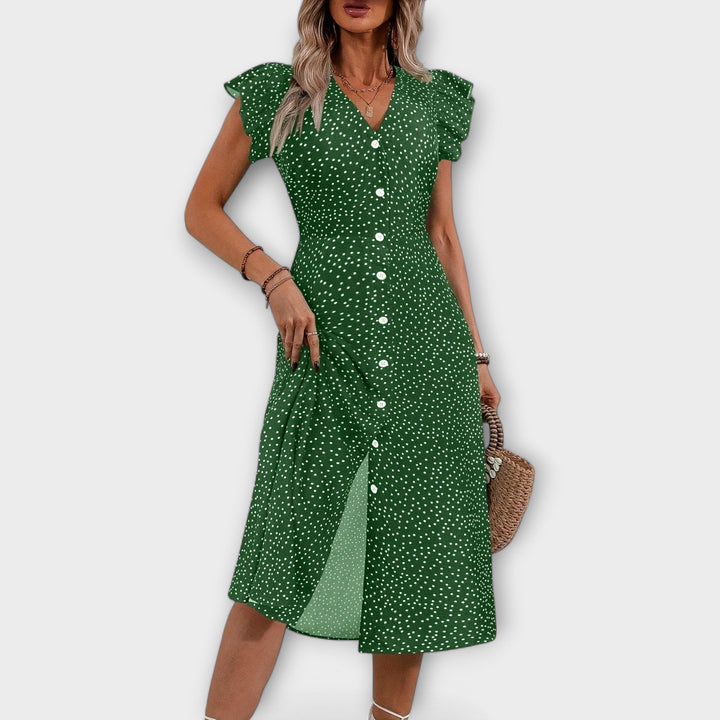 Oda - Chic red polka dot knee-length dress with button closure