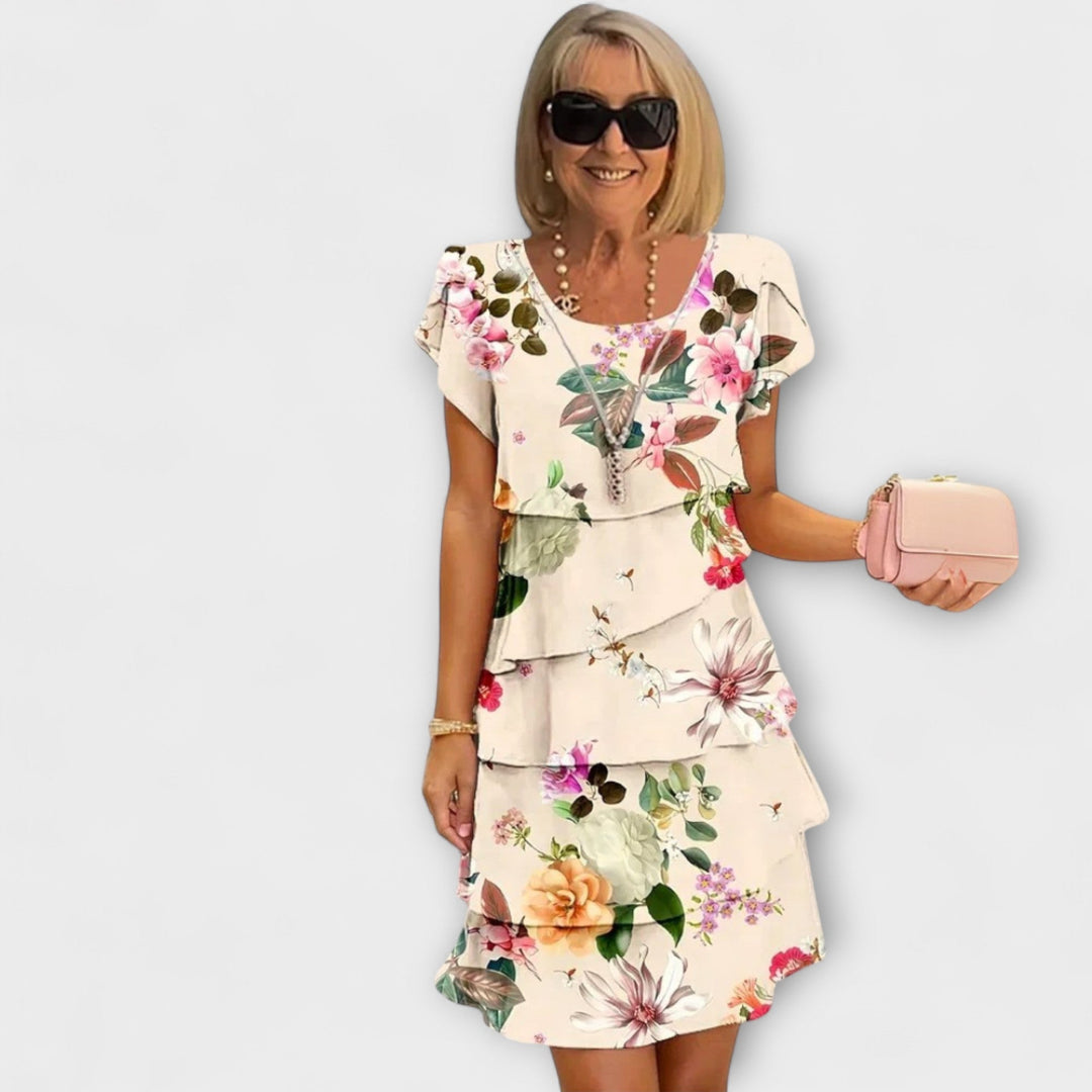Iselin - Hvit elegansekjole med blomstermønster