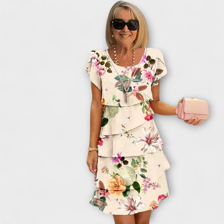 Iselin - Hvit elegansekjole med blomstermønster