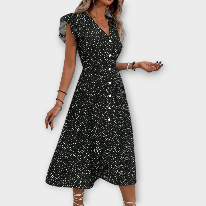 Oda - Chic red polka dot knee-length dress with button closure