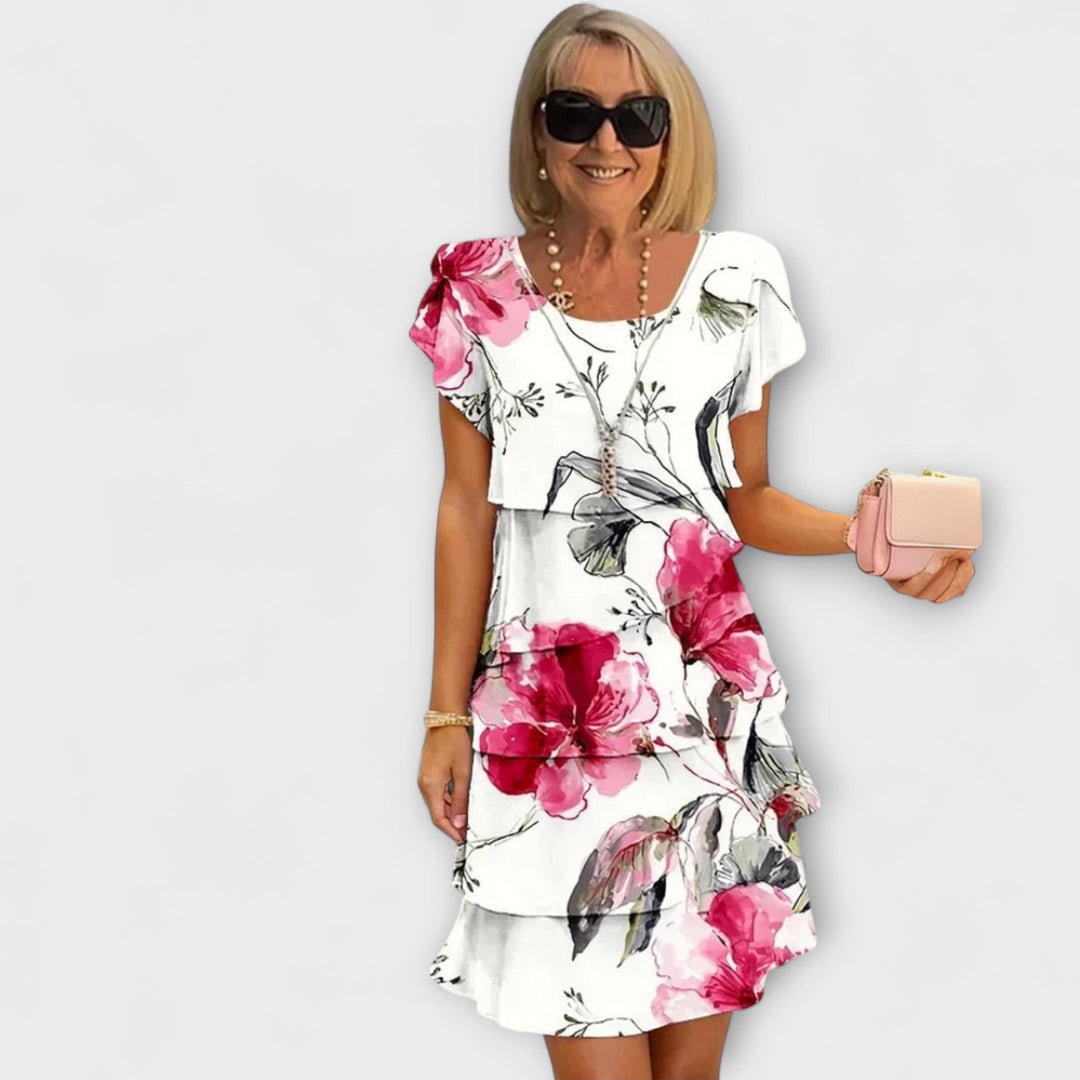 Iselin - Hvit elegansekjole med blomstermønster