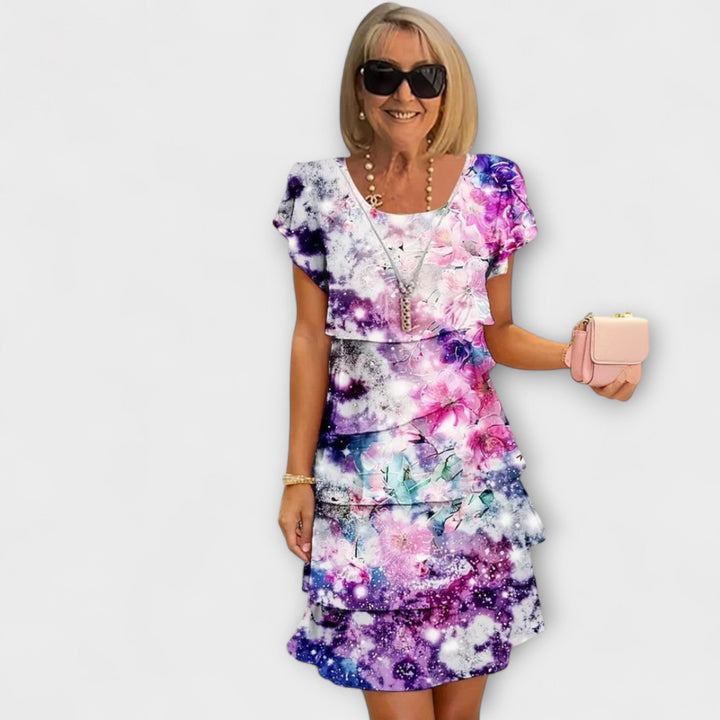 Iselin - Hvit elegansekjole med blomstermønster