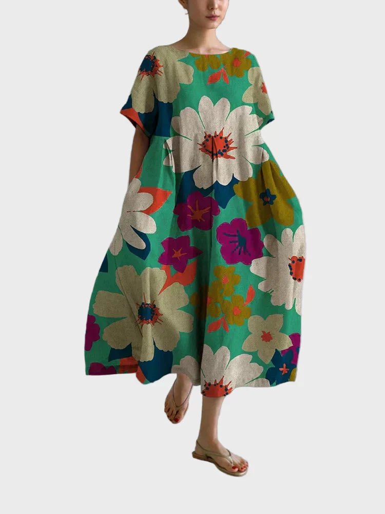 Hilde - Turkis kjole med blomstermønster