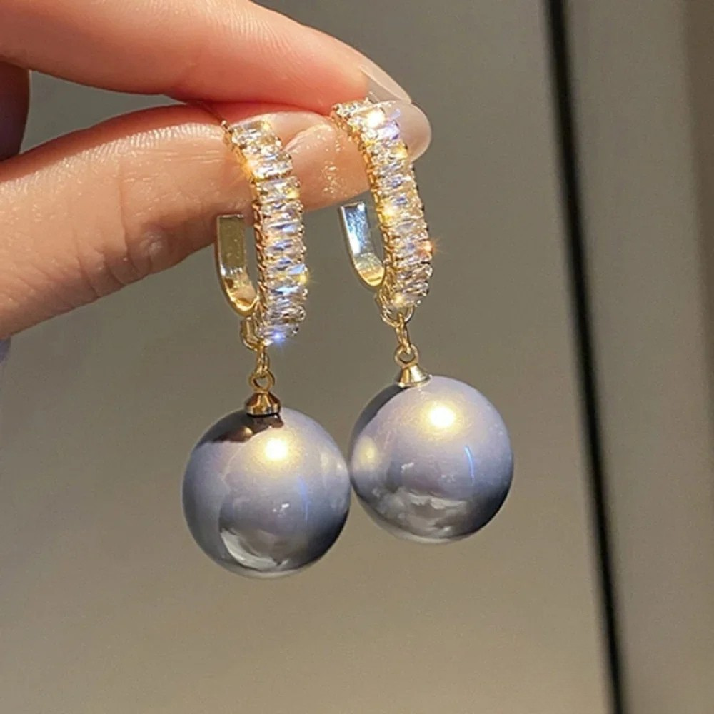 Iris - Elegante øredobber med perle-detaljer