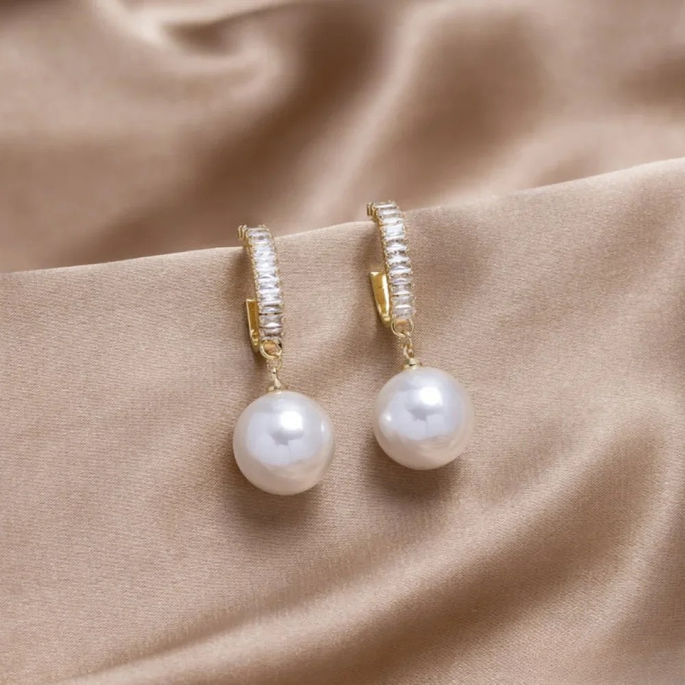 Iris - Elegante øredobber med perle-detaljer