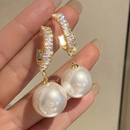 Iris - Elegante øredobber med perle-detaljer