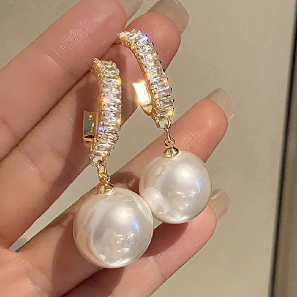 Iris - Elegante øredobber med perle-detaljer
