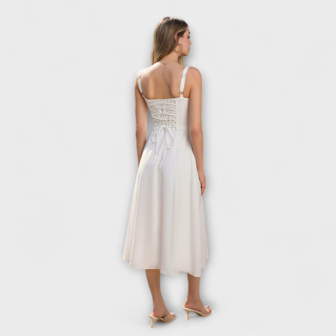Ingfrid - Cream-coloured dress with ruffles and slit