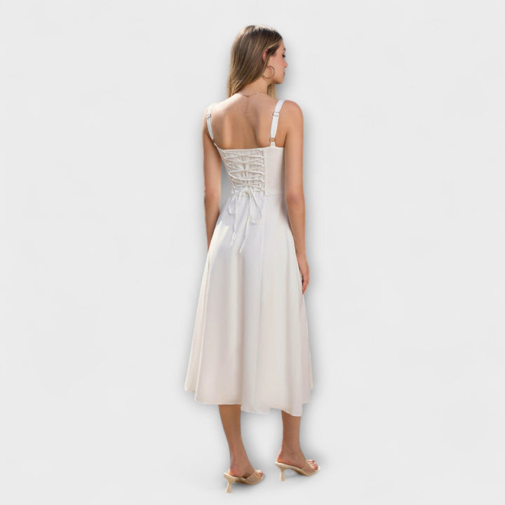 Ingfrid - Cream-coloured dress with ruffles and slit