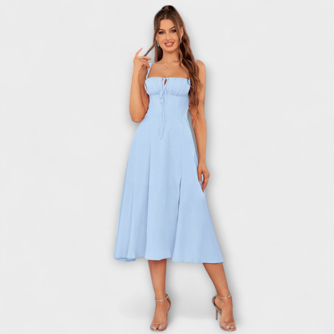 Ingfrid - Cream-coloured dress with ruffles and slit