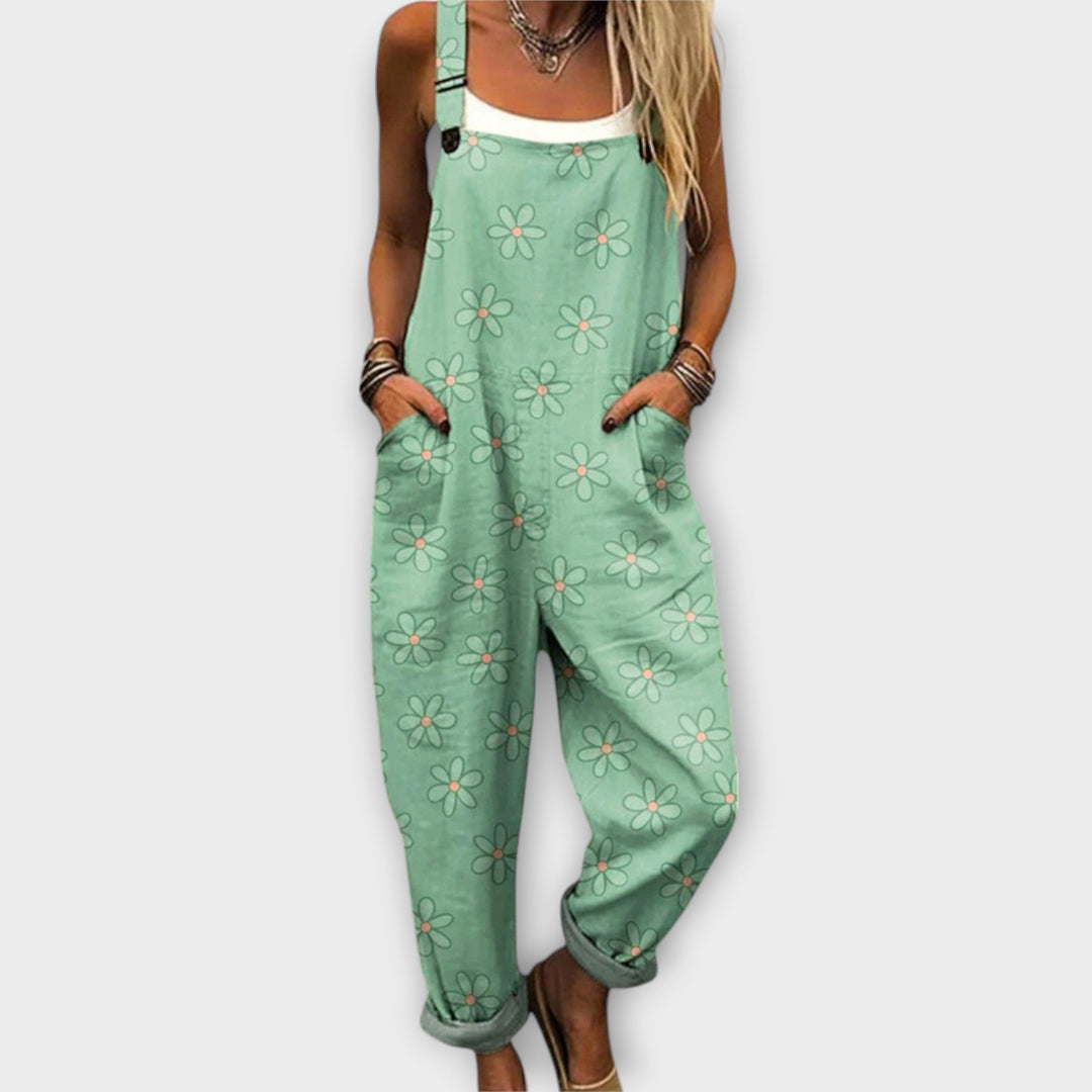 Synnøve - Grüne Latzhose mit Blumenmuster
