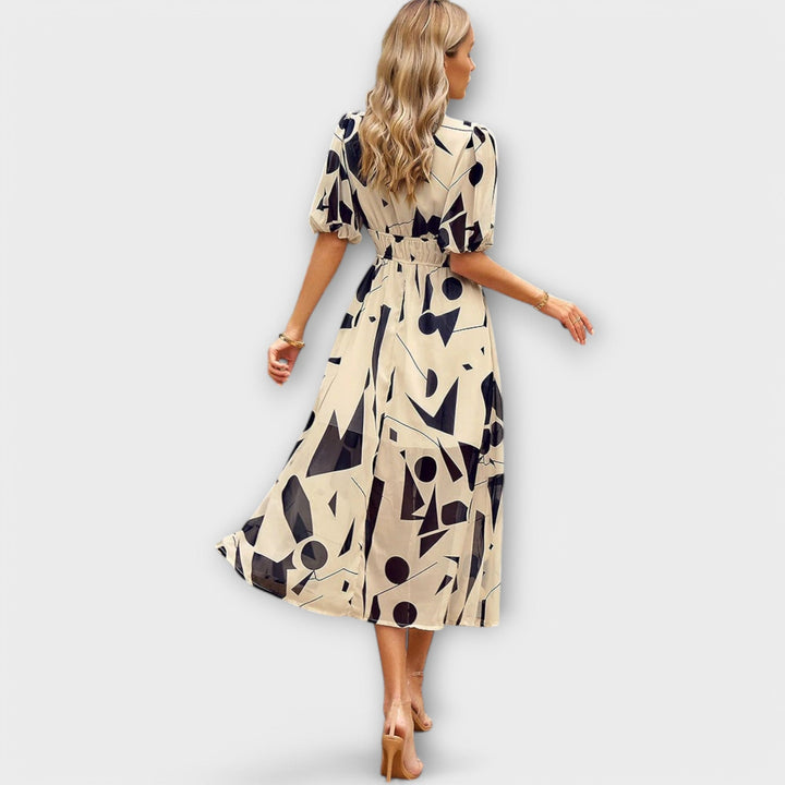 Idunn - Blue knee-length dress with floral pattern