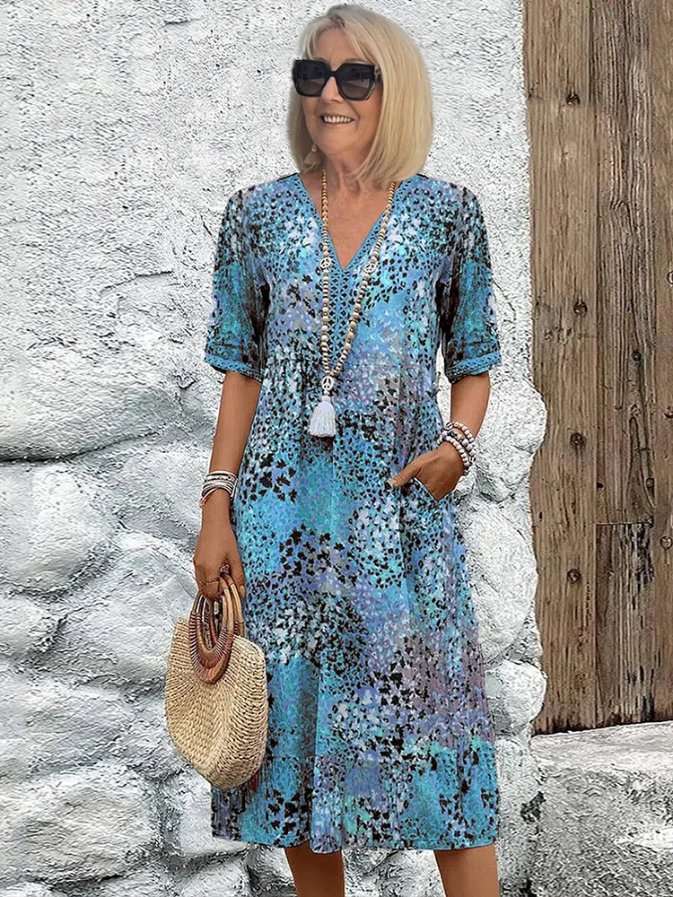 Anne - Rød knelang kjole med blomstermønster