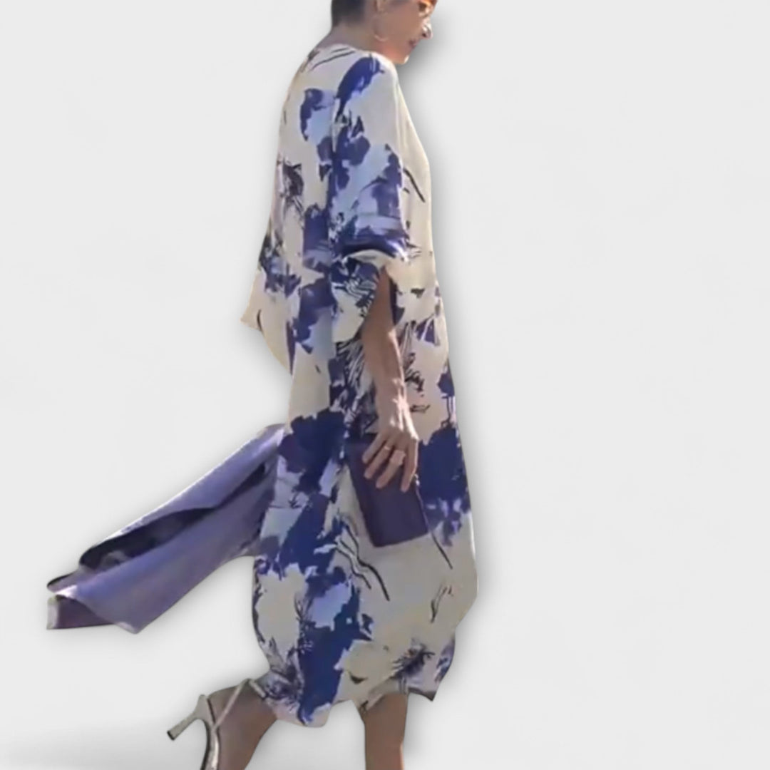 Oda - Hvit-lilla kjole med blomstermønster