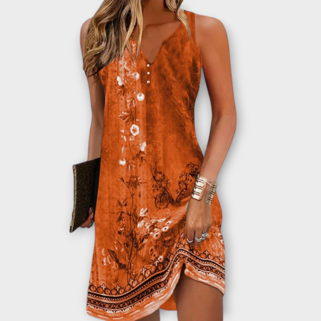 Liv - Blue knee-length dress with an ornamental pattern